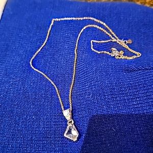 14k gold pendant with Maine aquamarine and white sapphire